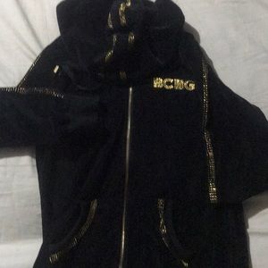 This is a black, velour, BCBG jacket.